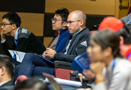 Students engaging with international universities at the education fair